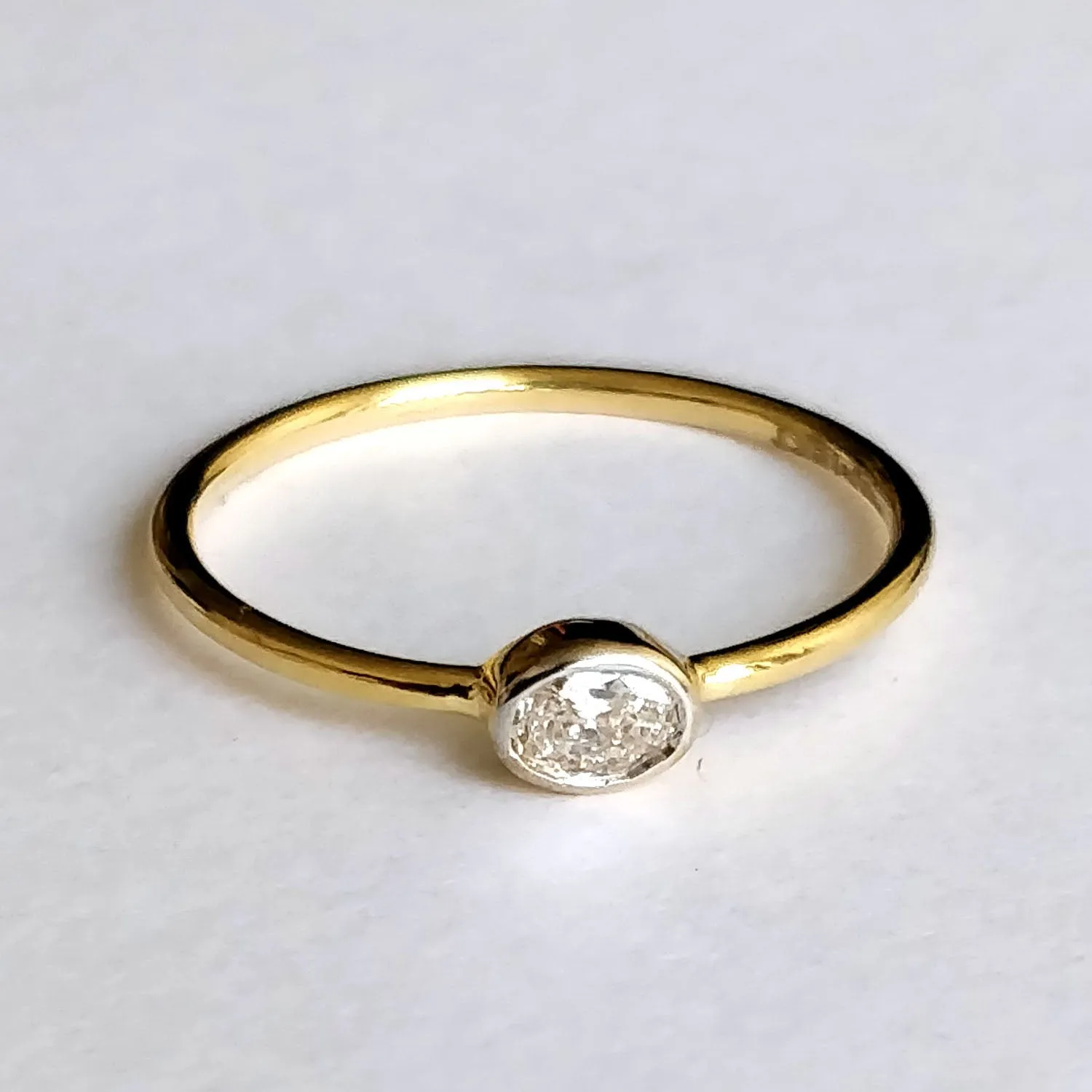 East West Minimal Bezel Set Oval Diamond Ring
