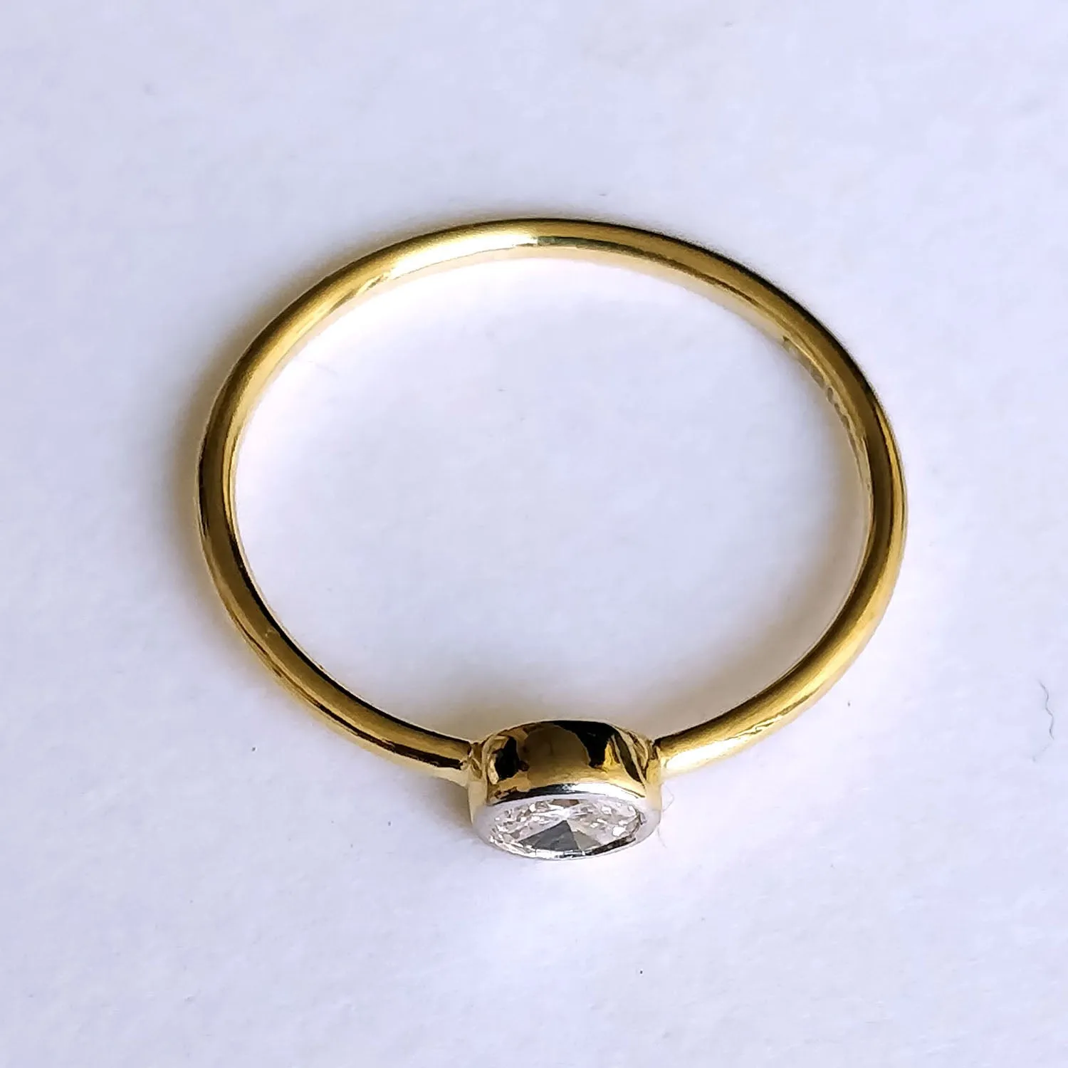 East West Minimal Bezel Set Oval Diamond Ring
