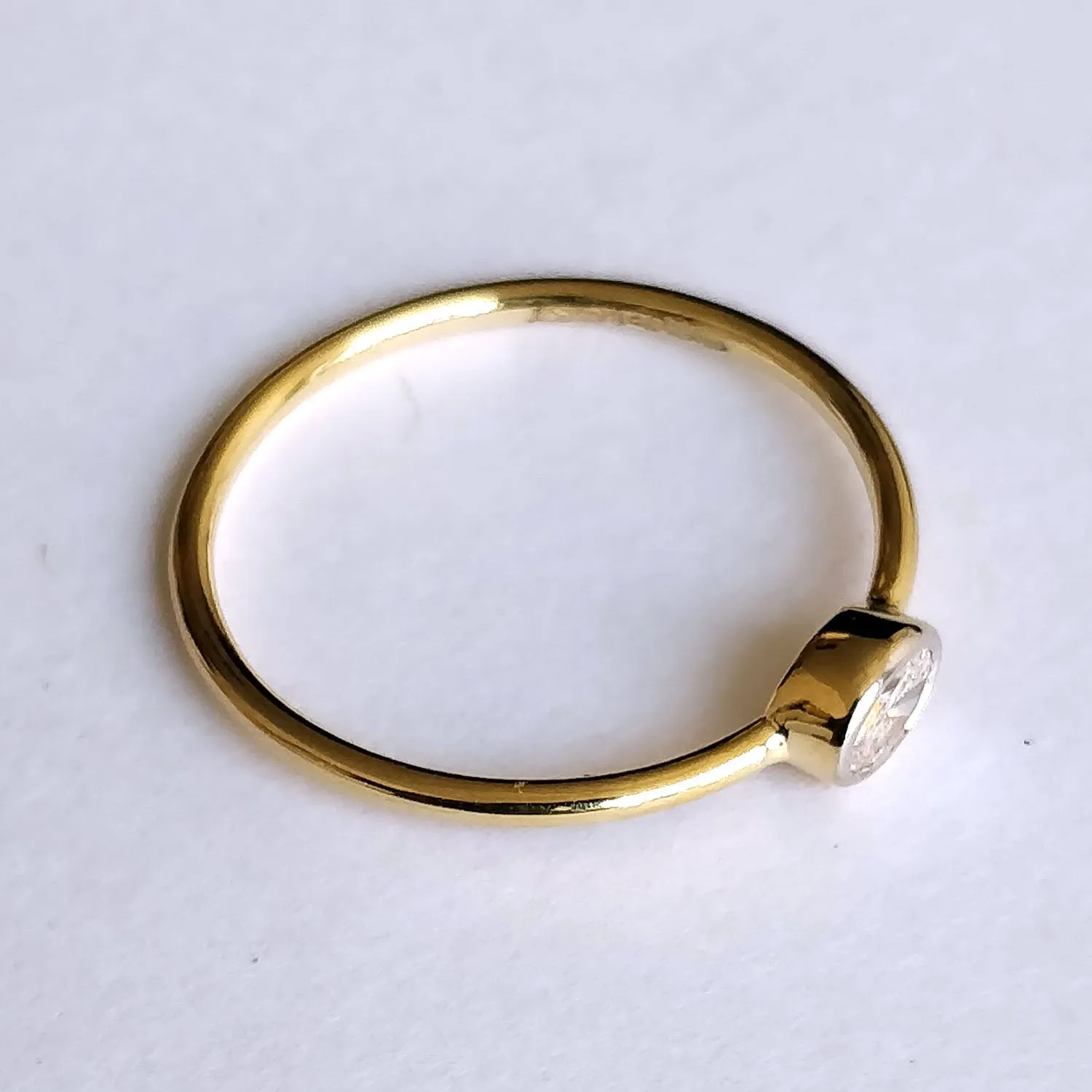 East West Minimal Bezel Set Oval Diamond Ring