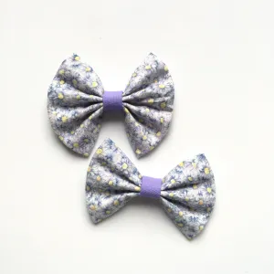 Periwinkle floral bow purple center